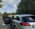 Серый Опель Инсигния, объемом двигателя 2 л и пробегом 340 тыс. км за 6315 $, фото 2 на Automoto.ua