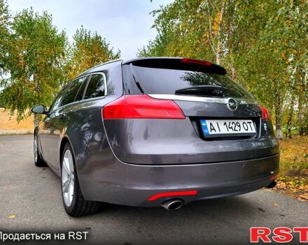 Серый Опель Инсигния, объемом двигателя 2 л и пробегом 175 тыс. км за 7500 $, фото 2 на Automoto.ua