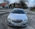 Серый Опель Инсигния, объемом двигателя 1.96 л и пробегом 240 тыс. км за 6900 $, фото 4 на Automoto.ua