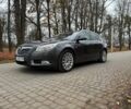 Серый Опель Инсигния, объемом двигателя 2 л и пробегом 210 тыс. км за 159 $, фото 1 на Automoto.ua