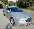 Серый Опель Инсигния, объемом двигателя 1.8 л и пробегом 217 тыс. км за 6400 $, фото 3 на Automoto.ua