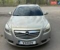 Серый Опель Инсигния, объемом двигателя 1.96 л и пробегом 305 тыс. км за 4800 $, фото 1 на Automoto.ua