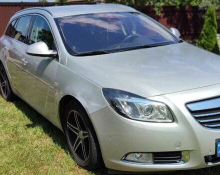 Серый Опель Инсигния, объемом двигателя 2 л и пробегом 243 тыс. км за 7300 $, фото 2 на Automoto.ua