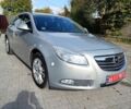 Серый Опель Инсигния, объемом двигателя 1.8 л и пробегом 217 тыс. км за 6400 $, фото 2 на Automoto.ua