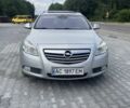 Сірий Опель Інсігнія, об'ємом двигуна 2 л та пробігом 260 тис. км за 6800 $, фото 1 на Automoto.ua