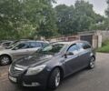 Серый Опель Инсигния, объемом двигателя 2 л и пробегом 330 тыс. км за 4000 $, фото 1 на Automoto.ua
