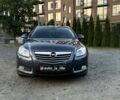 Серый Опель Инсигния, объемом двигателя 2 л и пробегом 330 тыс. км за 6546 $, фото 5 на Automoto.ua