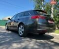 Серый Опель Инсигния, объемом двигателя 1.8 л и пробегом 190 тыс. км за 7650 $, фото 10 на Automoto.ua