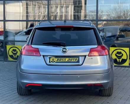 Серый Опель Инсигния, объемом двигателя 2 л и пробегом 309 тыс. км за 7300 $, фото 4 на Automoto.ua