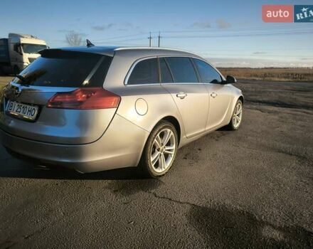 Серый Опель Инсигния, объемом двигателя 1.96 л и пробегом 295 тыс. км за 6500 $, фото 10 на Automoto.ua