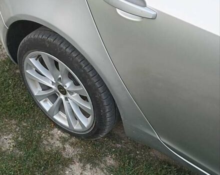 Серый Опель Инсигния, объемом двигателя 2 л и пробегом 245 тыс. км за 6700 $, фото 1 на Automoto.ua