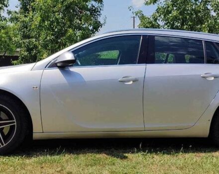 Серый Опель Инсигния, объемом двигателя 2 л и пробегом 243 тыс. км за 7300 $, фото 1 на Automoto.ua