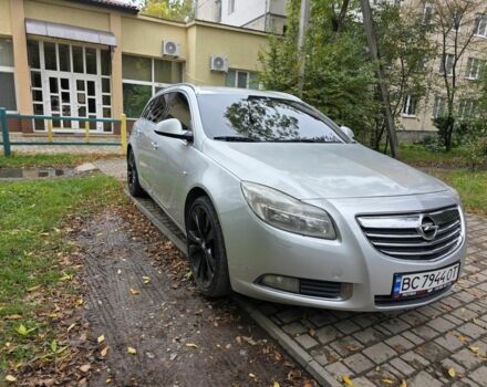 Серый Опель Инсигния, объемом двигателя 2 л и пробегом 239 тыс. км за 5900 $, фото 2 на Automoto.ua
