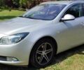 Серый Опель Инсигния, объемом двигателя 2 л и пробегом 243 тыс. км за 7900 $, фото 1 на Automoto.ua