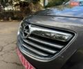 Серый Опель Инсигния, объемом двигателя 1.8 л и пробегом 232 тыс. км за 7850 $, фото 2 на Automoto.ua