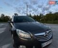 Серый Опель Инсигния, объемом двигателя 1.96 л и пробегом 268 тыс. км за 6000 $, фото 1 на Automoto.ua
