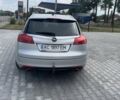 Сірий Опель Інсігнія, об'ємом двигуна 2 л та пробігом 260 тис. км за 6800 $, фото 4 на Automoto.ua