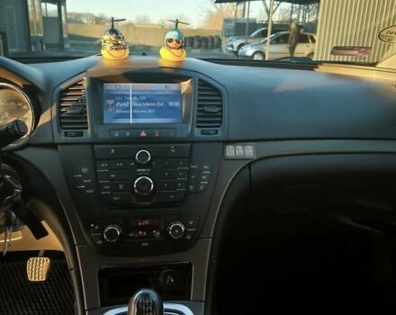 Серый Опель Инсигния, объемом двигателя 1.96 л и пробегом 295 тыс. км за 6500 $, фото 3 на Automoto.ua