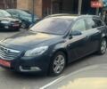 Серый Опель Инсигния, объемом двигателя 1.8 л и пробегом 190 тыс. км за 7499 $, фото 2 на Automoto.ua