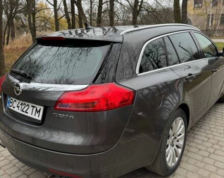 Серый Опель Инсигния, объемом двигателя 2 л и пробегом 210 тыс. км за 159 $, фото 3 на Automoto.ua