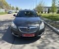 Серый Опель Инсигния, объемом двигателя 1.8 л и пробегом 190 тыс. км за 7550 $, фото 6 на Automoto.ua
