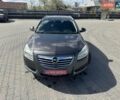 Серый Опель Инсигния, объемом двигателя 2 л и пробегом 236 тыс. км за 6700 $, фото 2 на Automoto.ua