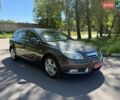 Серый Опель Инсигния, объемом двигателя 1.8 л и пробегом 190 тыс. км за 7650 $, фото 2 на Automoto.ua