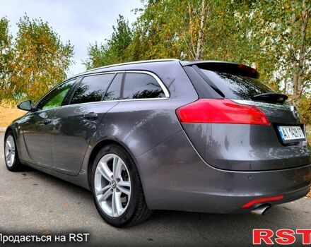 Серый Опель Инсигния, объемом двигателя 2 л и пробегом 175 тыс. км за 7500 $, фото 1 на Automoto.ua