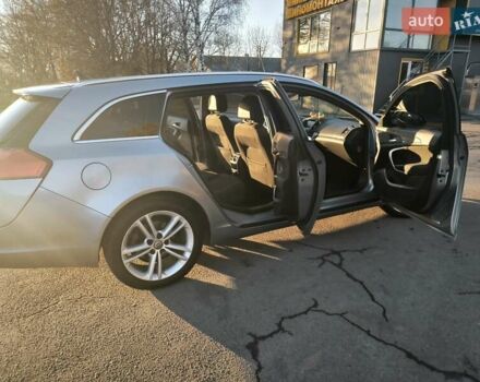 Серый Опель Инсигния, объемом двигателя 1.96 л и пробегом 295 тыс. км за 6500 $, фото 2 на Automoto.ua