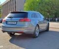 Сірий Опель Інсігнія, об'ємом двигуна 2 л та пробігом 213 тис. км за 9500 $, фото 6 на Automoto.ua
