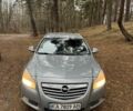 Серый Опель Инсигния, объемом двигателя 2 л и пробегом 352 тыс. км за 5600 $, фото 1 на Automoto.ua