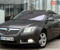 Серый Опель Инсигния, объемом двигателя 2 л и пробегом 246 тыс. км за 6400 $, фото 1 на Automoto.ua