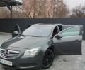 Серый Опель Инсигния, объемом двигателя 2 л и пробегом 290 тыс. км за 7999 $, фото 6 на Automoto.ua