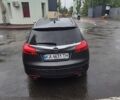 Сірий Опель Інсігнія, об'ємом двигуна 2 л та пробігом 262 тис. км за 7499 $, фото 6 на Automoto.ua