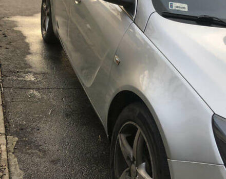 Серый Опель Инсигния, объемом двигателя 2 л и пробегом 260 тыс. км за 8000 $, фото 3 на Automoto.ua