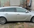 Серый Опель Инсигния, объемом двигателя 2 л и пробегом 238 тыс. км за 8400 $, фото 1 на Automoto.ua