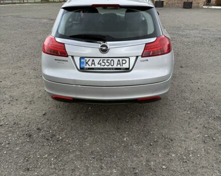 Серый Опель Инсигния, объемом двигателя 2 л и пробегом 265 тыс. км за 6800 $, фото 4 на Automoto.ua