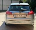 Сірий Опель Інсігнія, об'ємом двигуна 2 л та пробігом 295 тис. км за 5100 $, фото 4 на Automoto.ua