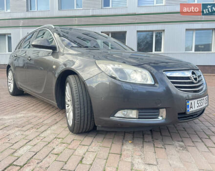 Серый Опель Инсигния, объемом двигателя 1.96 л и пробегом 300 тыс. км за 9200 $, фото 2 на Automoto.ua
