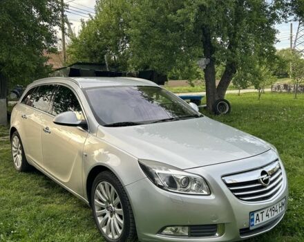 Серый Опель Инсигния, объемом двигателя 2 л и пробегом 256 тыс. км за 8500 $, фото 1 на Automoto.ua