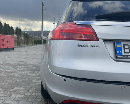 Сірий Опель Інсігнія, об'ємом двигуна 2 л та пробігом 260 тис. км за 8000 $, фото 7 на Automoto.ua