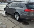 Серый Опель Инсигния, объемом двигателя 1.96 л и пробегом 180 тыс. км за 9100 $, фото 1 на Automoto.ua