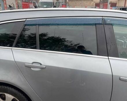 Серый Опель Инсигния, объемом двигателя 1.96 л и пробегом 297 тыс. км за 7400 $, фото 4 на Automoto.ua