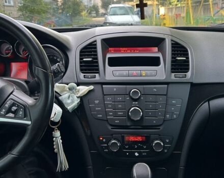 Серый Опель Инсигния, объемом двигателя 2 л и пробегом 256 тыс. км за 8500 $, фото 6 на Automoto.ua