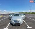 Серый Опель Инсигния, объемом двигателя 2 л и пробегом 230 тыс. км за 8200 $, фото 4 на Automoto.ua