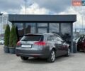 Сірий Опель Інсігнія, об'ємом двигуна 2 л та пробігом 264 тис. км за 7490 $, фото 4 на Automoto.ua