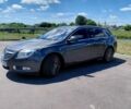 Серый Опель Инсигния, объемом двигателя 2 л и пробегом 244 тыс. км за 7200 $, фото 1 на Automoto.ua