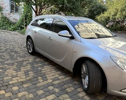 Серый Опель Инсигния, объемом двигателя 1.96 л и пробегом 295 тыс. км за 9200 $, фото 3 на Automoto.ua