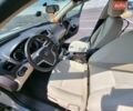 Серый Опель Инсигния, объемом двигателя 2 л и пробегом 230 тыс. км за 8200 $, фото 7 на Automoto.ua