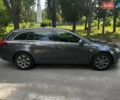 Сірий Опель Інсігнія, об'ємом двигуна 2 л та пробігом 282 тис. км за 10190 $, фото 2 на Automoto.ua